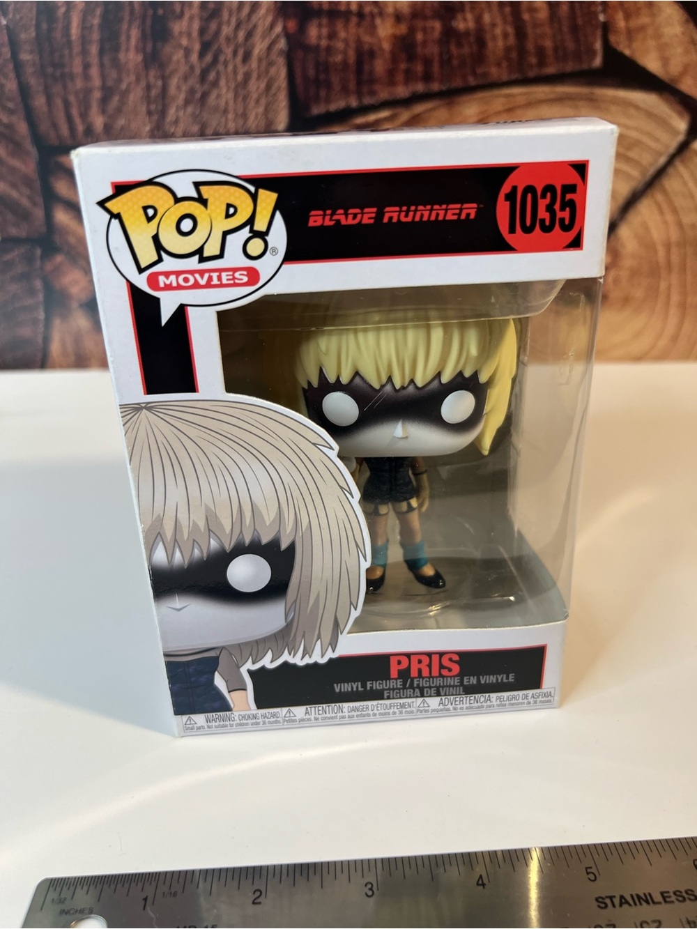 Funko PRIS Blonde Hair Black Mask Vinyl Figure (Blue Socks, Tan Shoes)